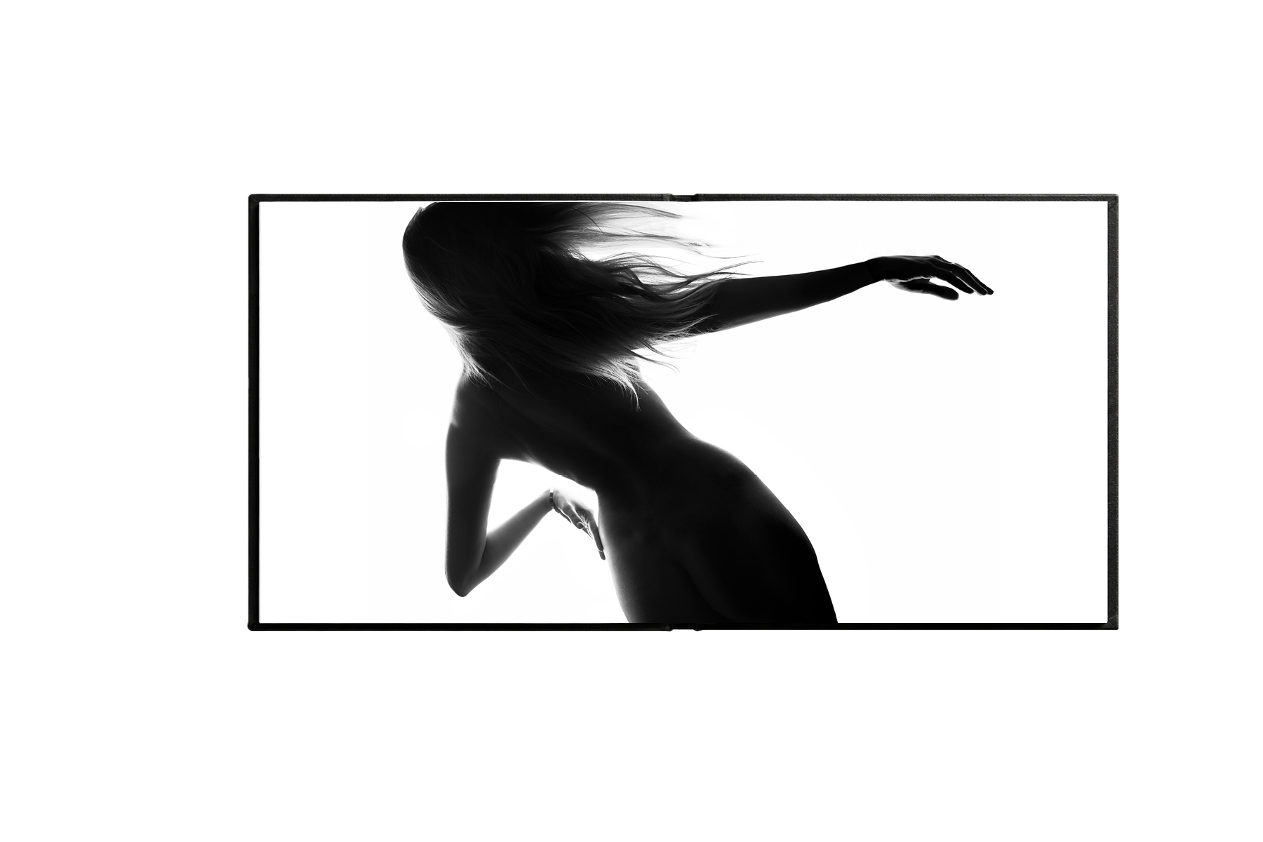 Open Femaleform spread with full-bleed black-and-white photograph